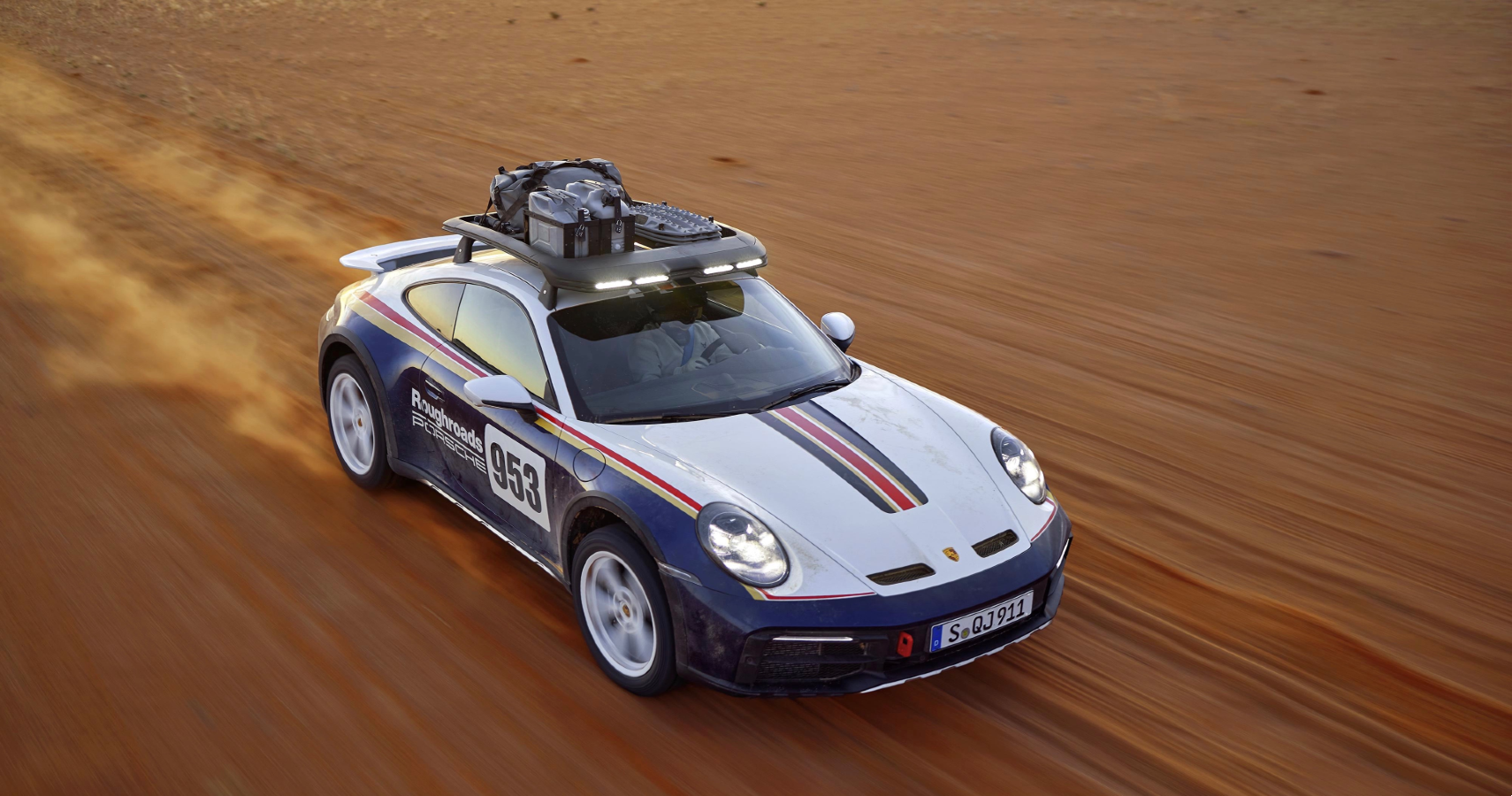 A 2023 Porsche 911 Dakar in the desert