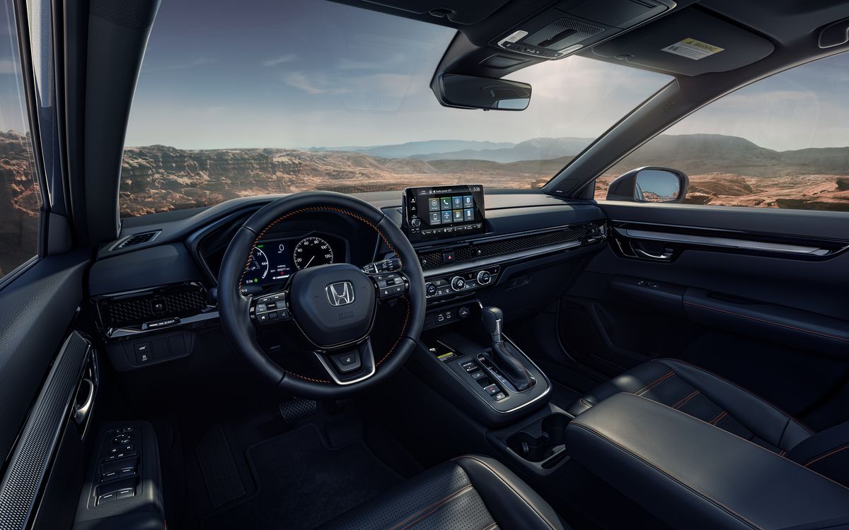 The elegant interior of the 2023 Honda CR-V Sport Touring trim.