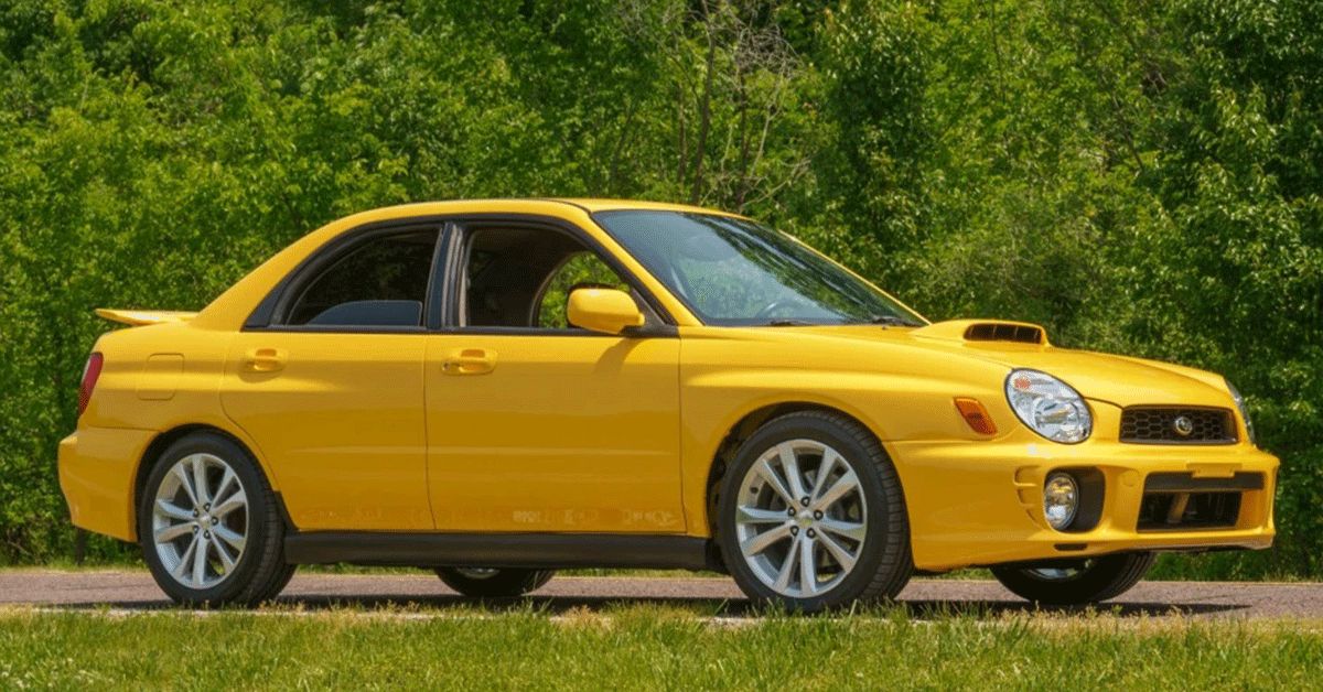 2003-Subaru-Impreza-WRX-sedan-(yellow)---side