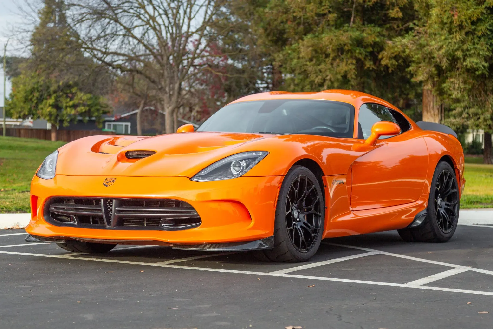 Orange 2014 Dodge SRT Viper TA in a parking lot