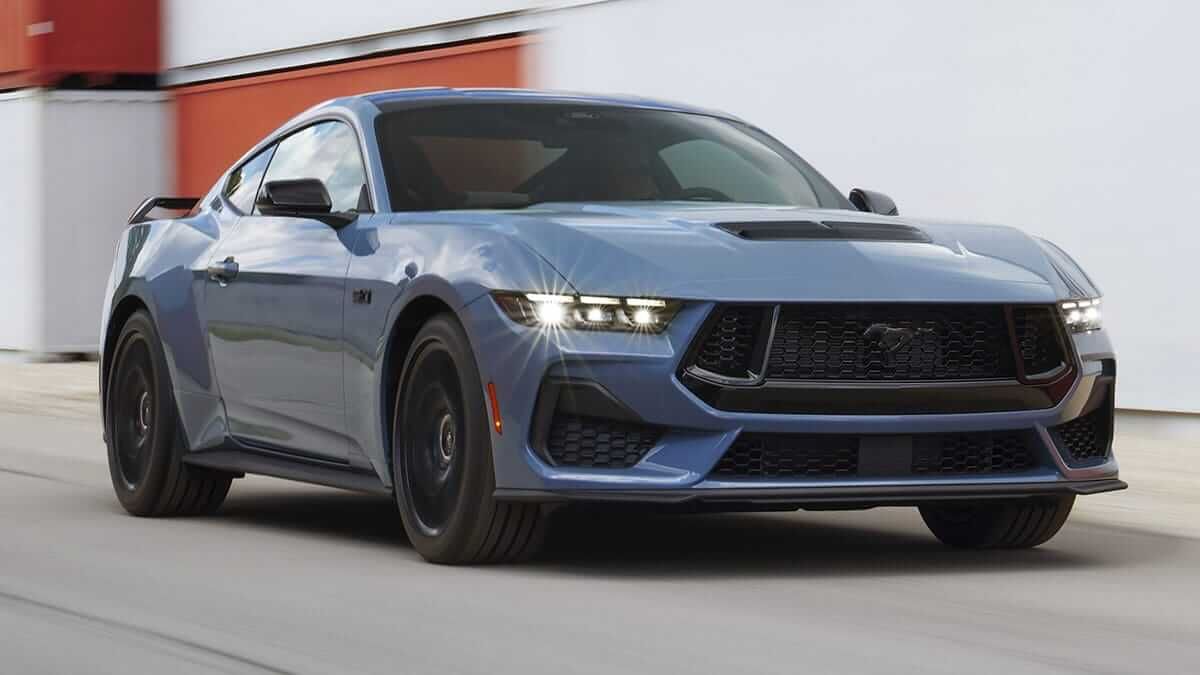 Blue 2023 Ford Mustang on the road