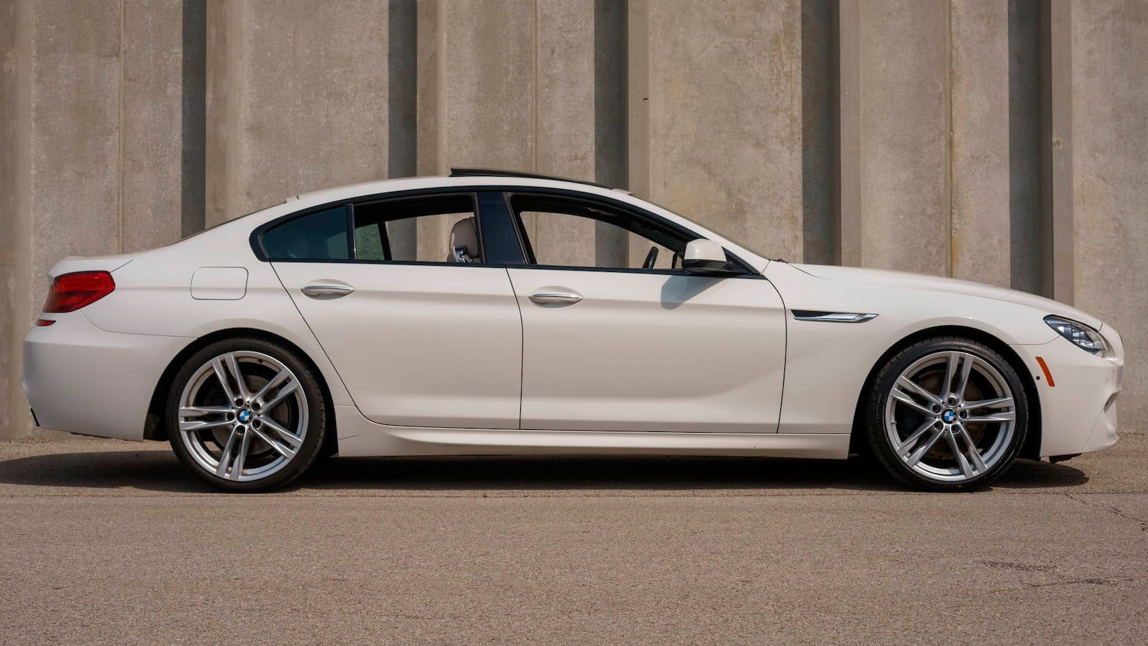 Side View Of White BMW 650I Xdrive Gran Coupe - 3rd generation 2015-2019