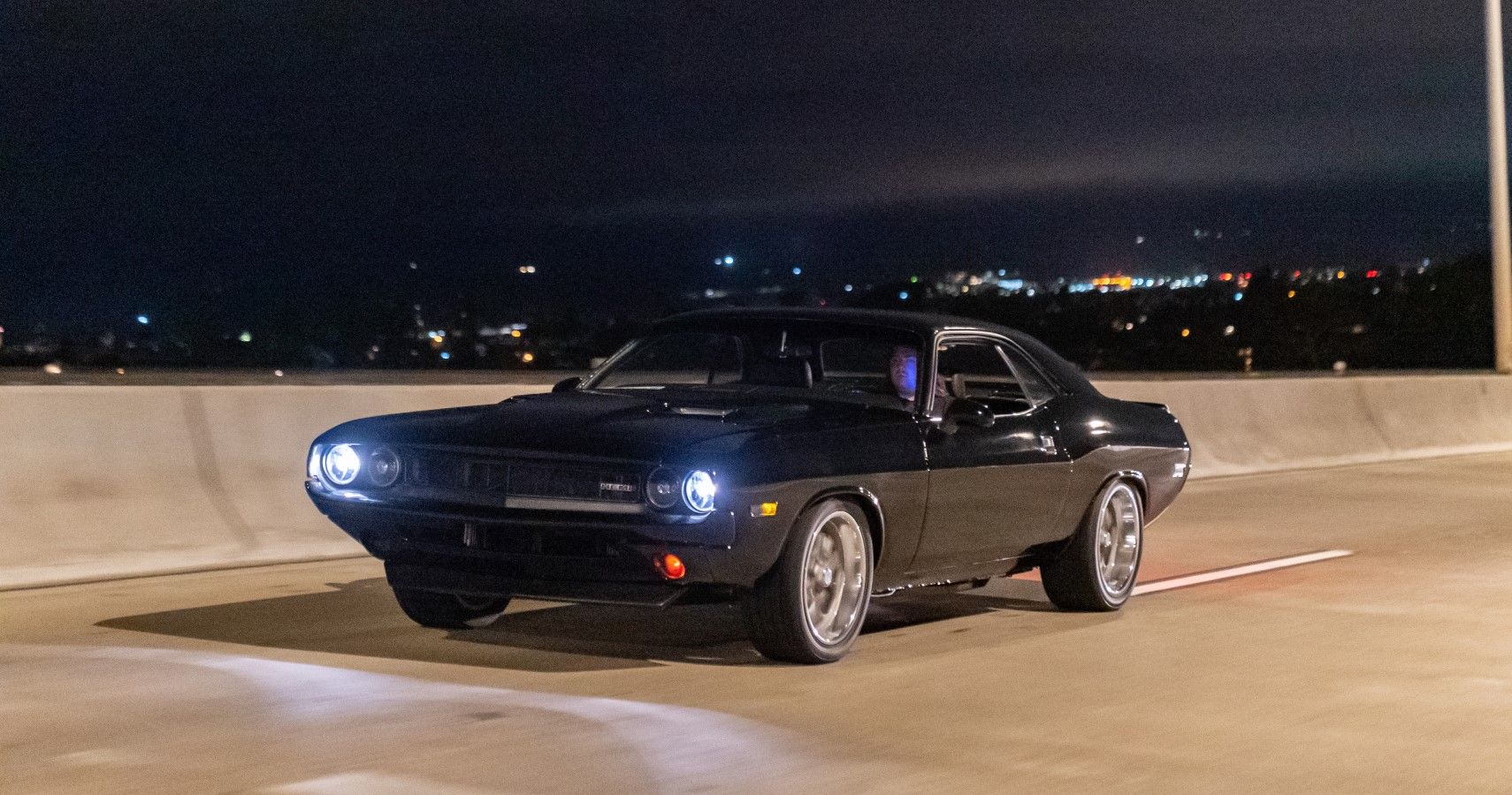 Restomods 1971 Dodge Challenger cruising on the highway