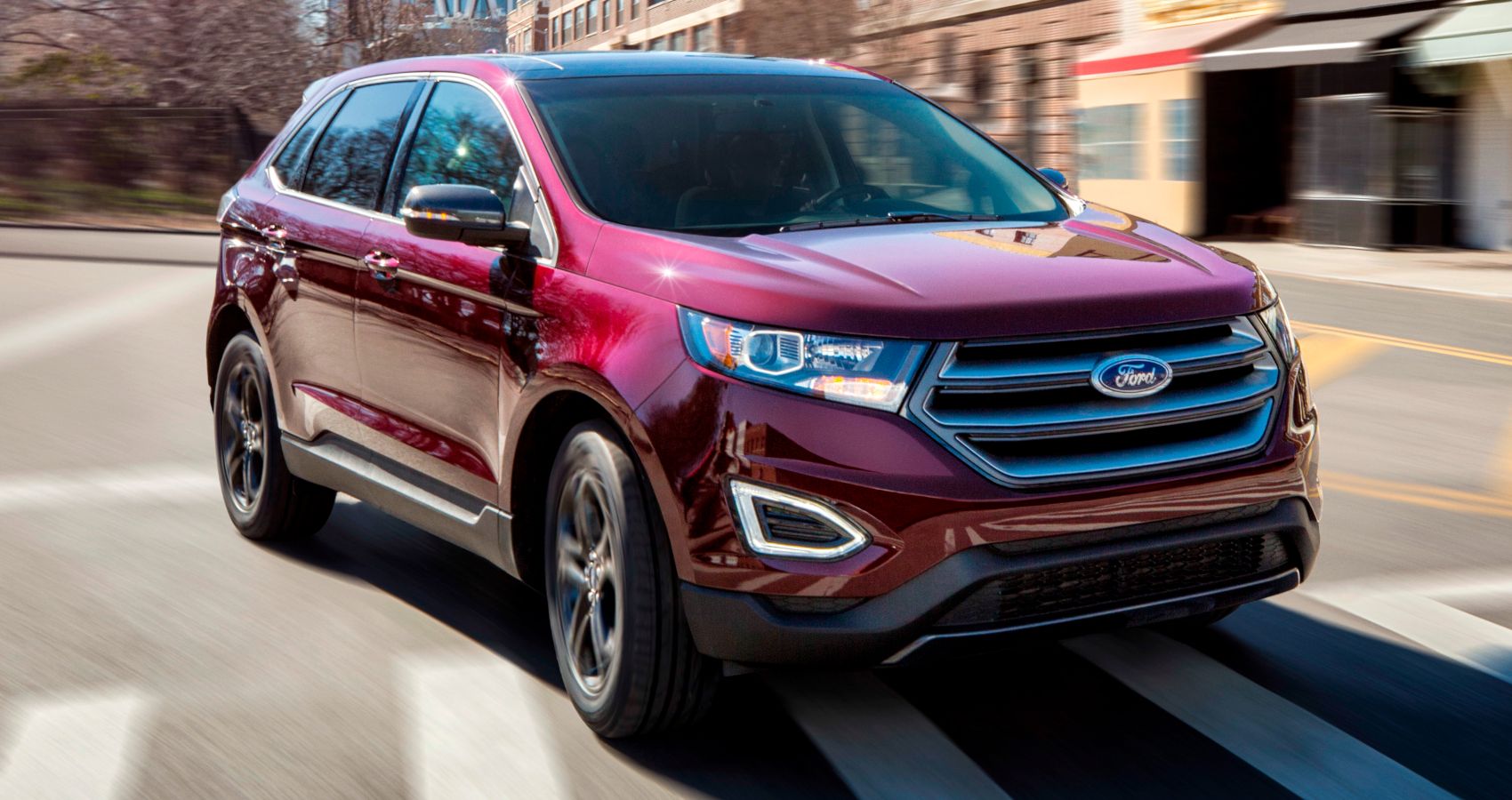Red 2018 Ford Edge on the road