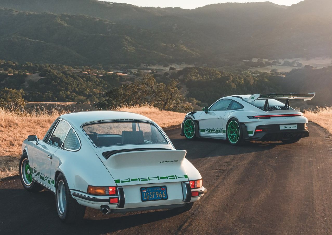 White Porsche 911 RS parked on the track