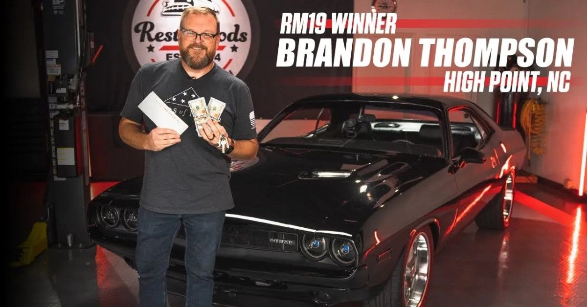 Restomods 1971 Dodge Challenger giveaway winner Brandon Thompson with his prized posession