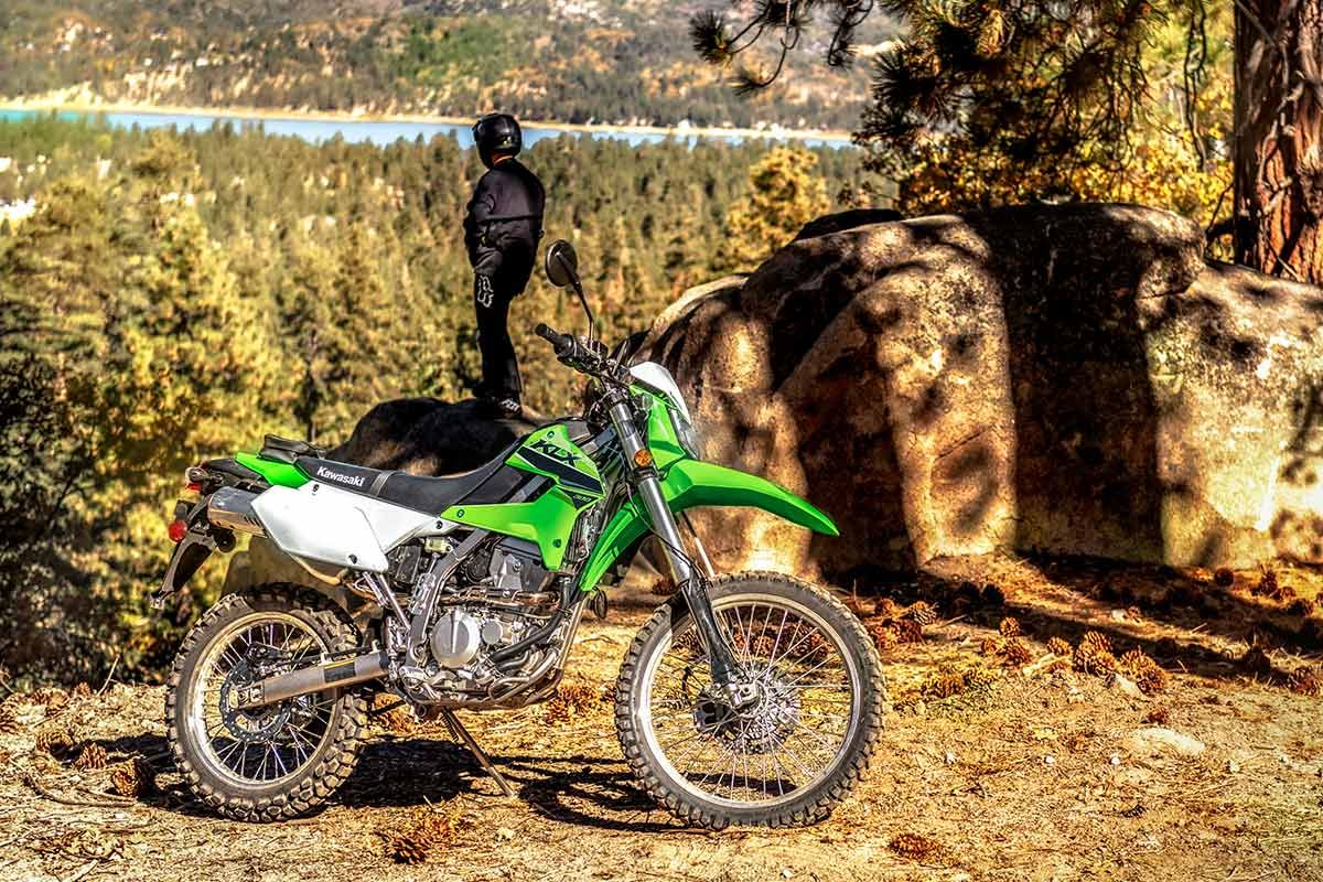 Green 2023 KLX300 dual sport parked