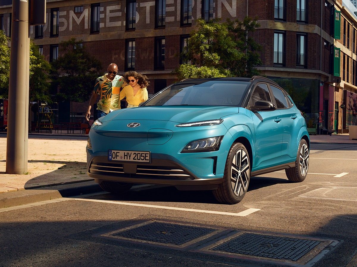 Blue 2023 Hyundai Kona parked on a city street