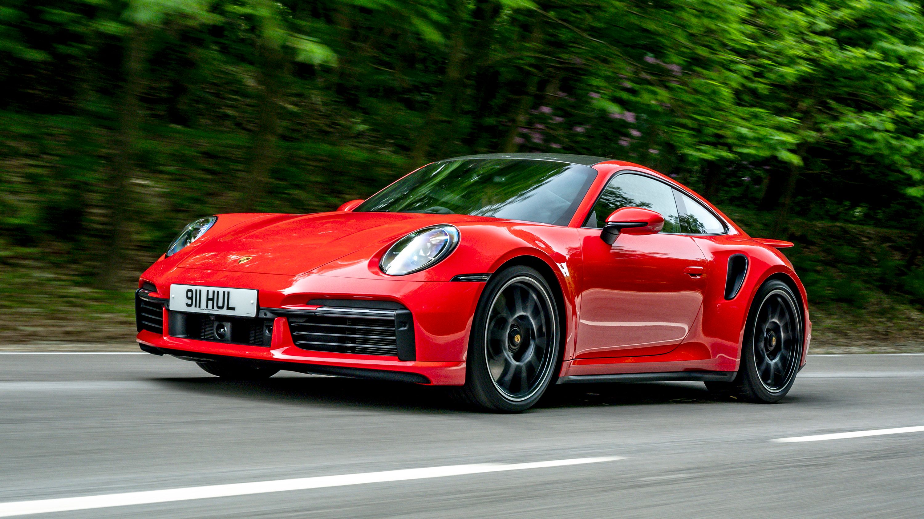Red 2022 Porsche 911 Turbo S on the road