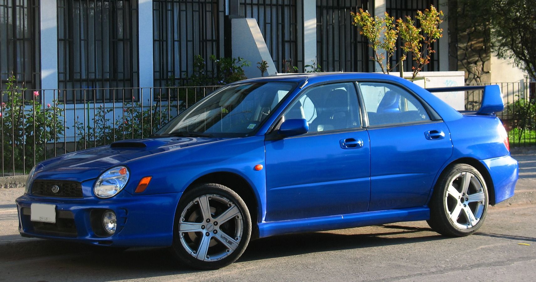 The 2002 Bugeye Subaru Impreza parked on the street.