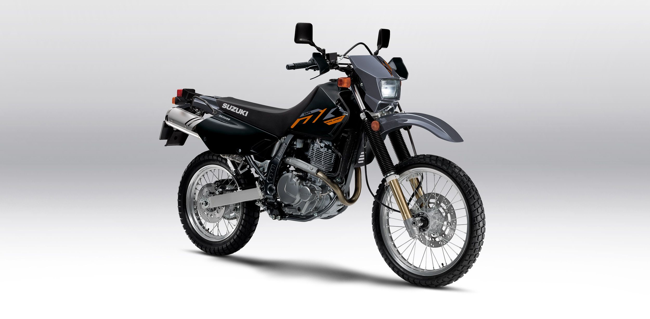 Black 2023 DR650S dual sport parked