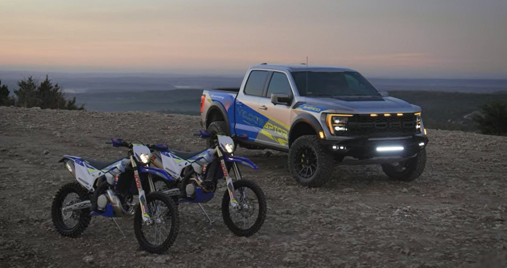 Hennessey VelociRaptor 600 truck and two bikes, front quarter view
