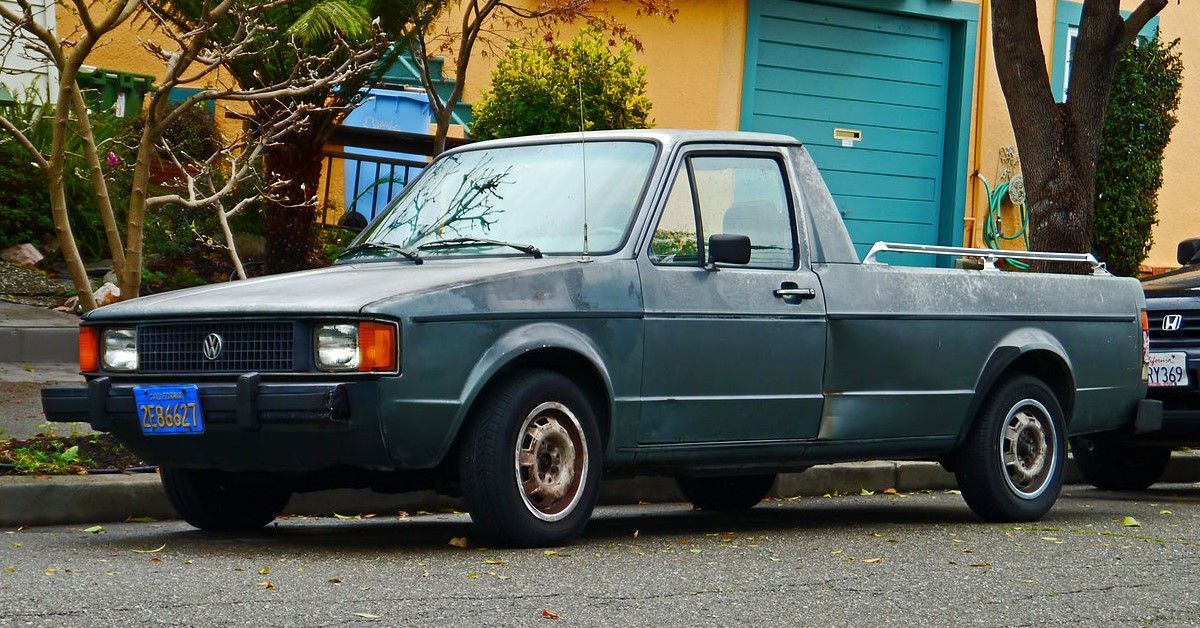 The 1982 Volkswagen Rabbit Pickup parked in front of a private house. 