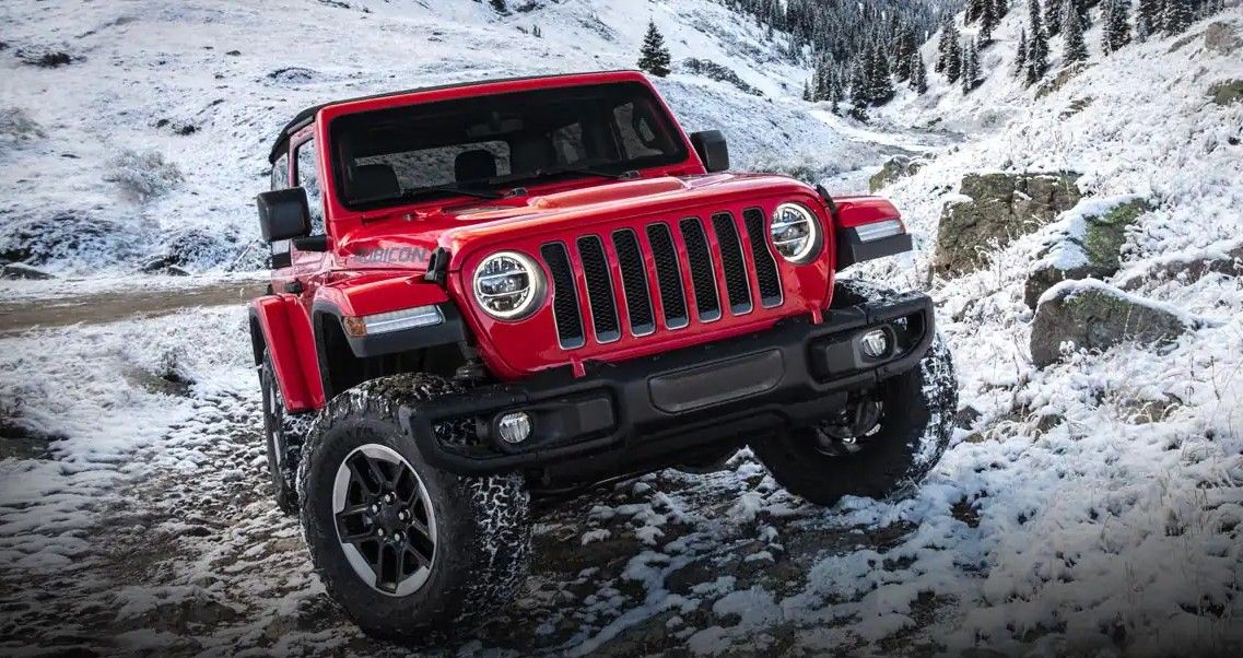 red 2022 Jeep Wrangler in snow
