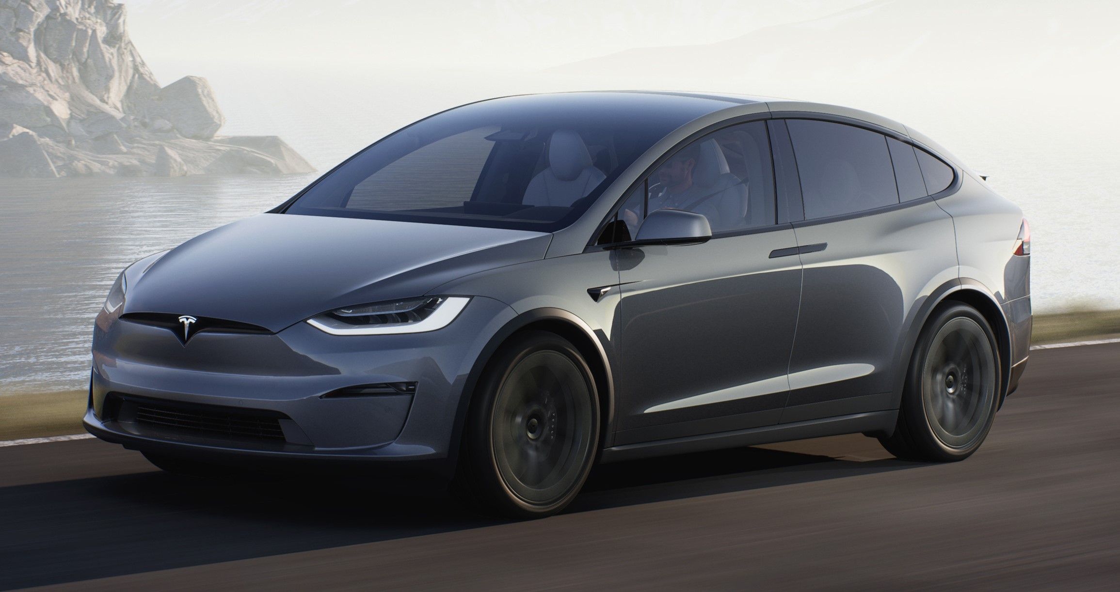 Tesla Model X cinza 2022 dirigido na estrada