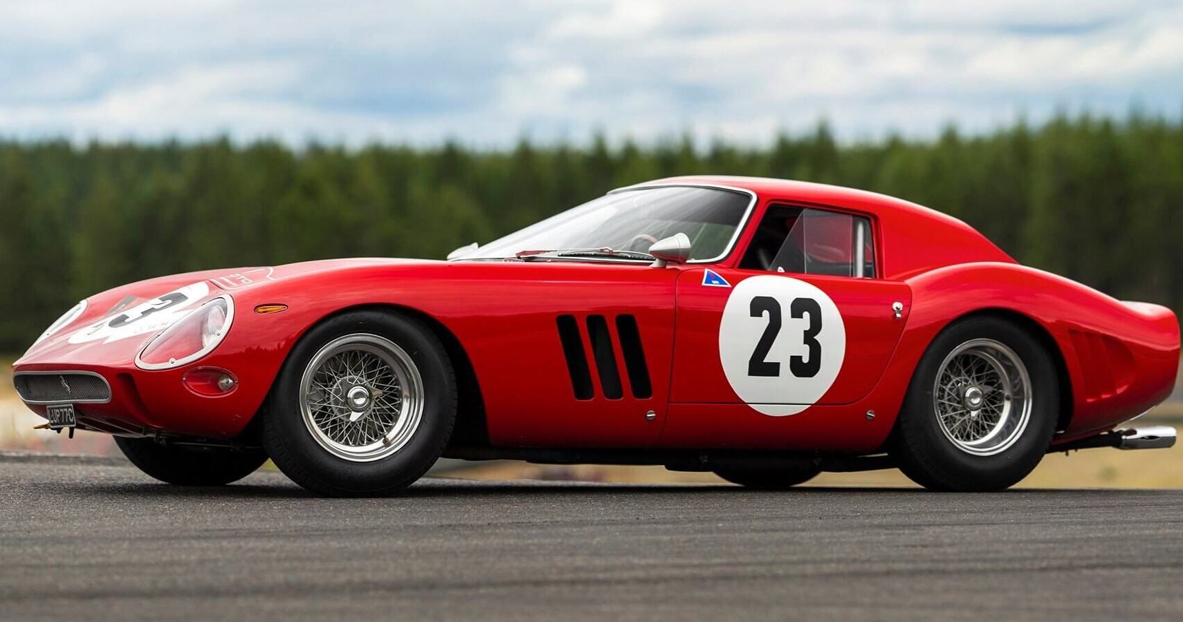 A red 1962 Ferrari 250 GTO parked
