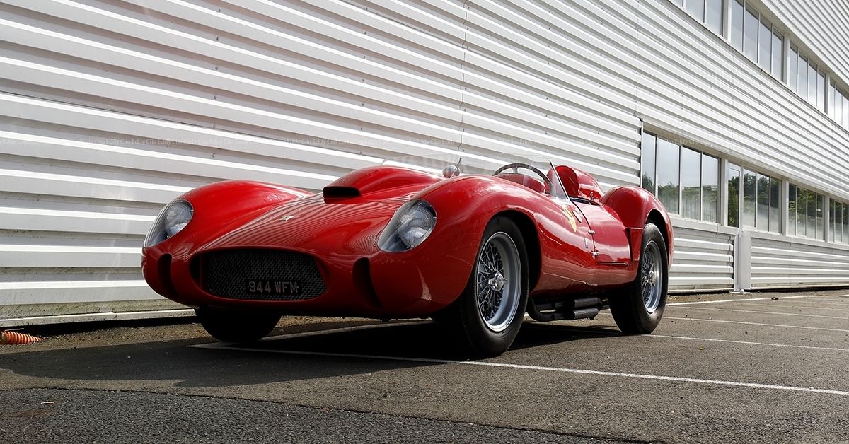 A red 1958 Ferrari 250 Testa Rossa parked