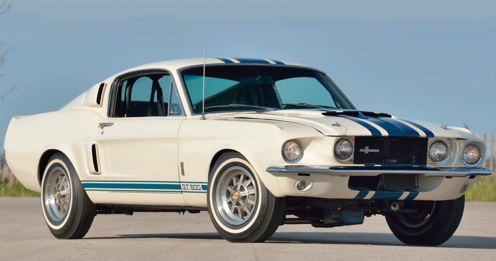 White 1967 Shelby Mustang GT500 Super Snake parked