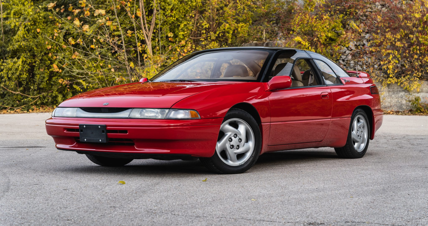 Red 1996 Subaru SVX front view