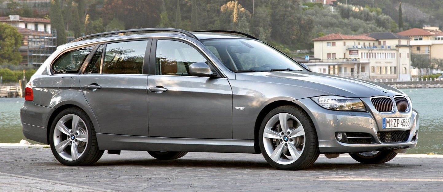 BMW 3 Series Touring 2009 gray parked outdoors