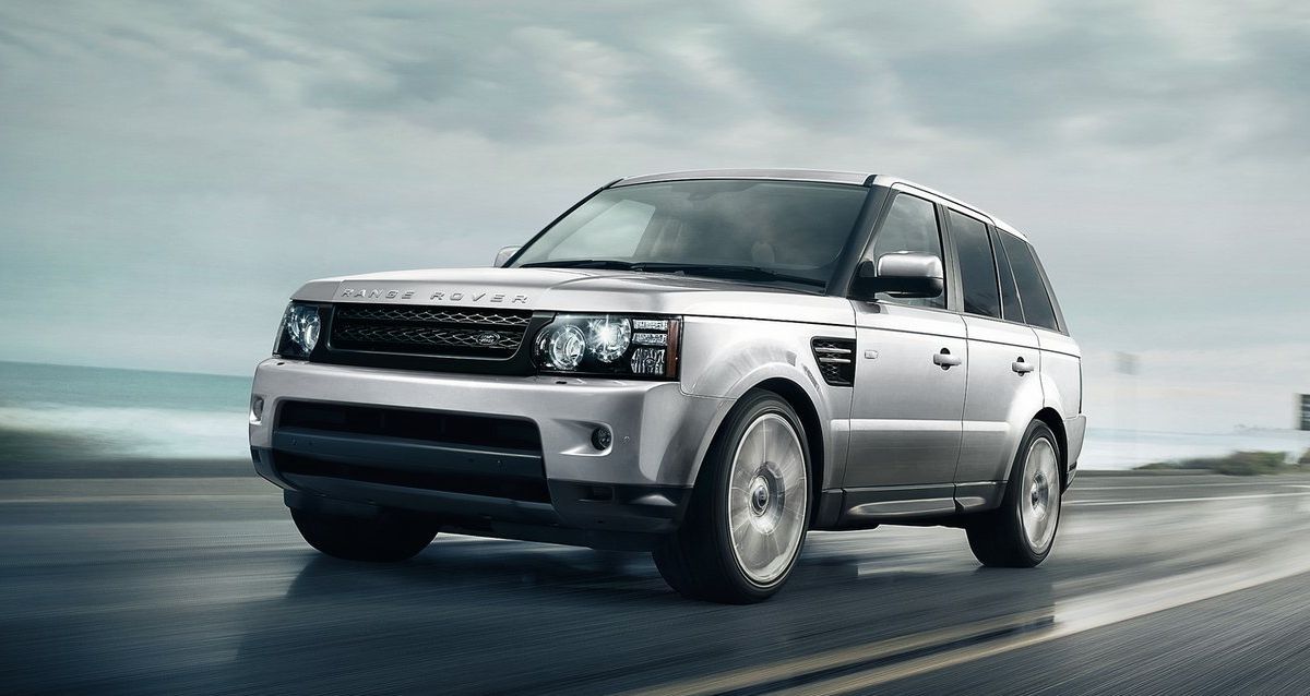 Silver 2013 Land Rover Ranger Rover on the road