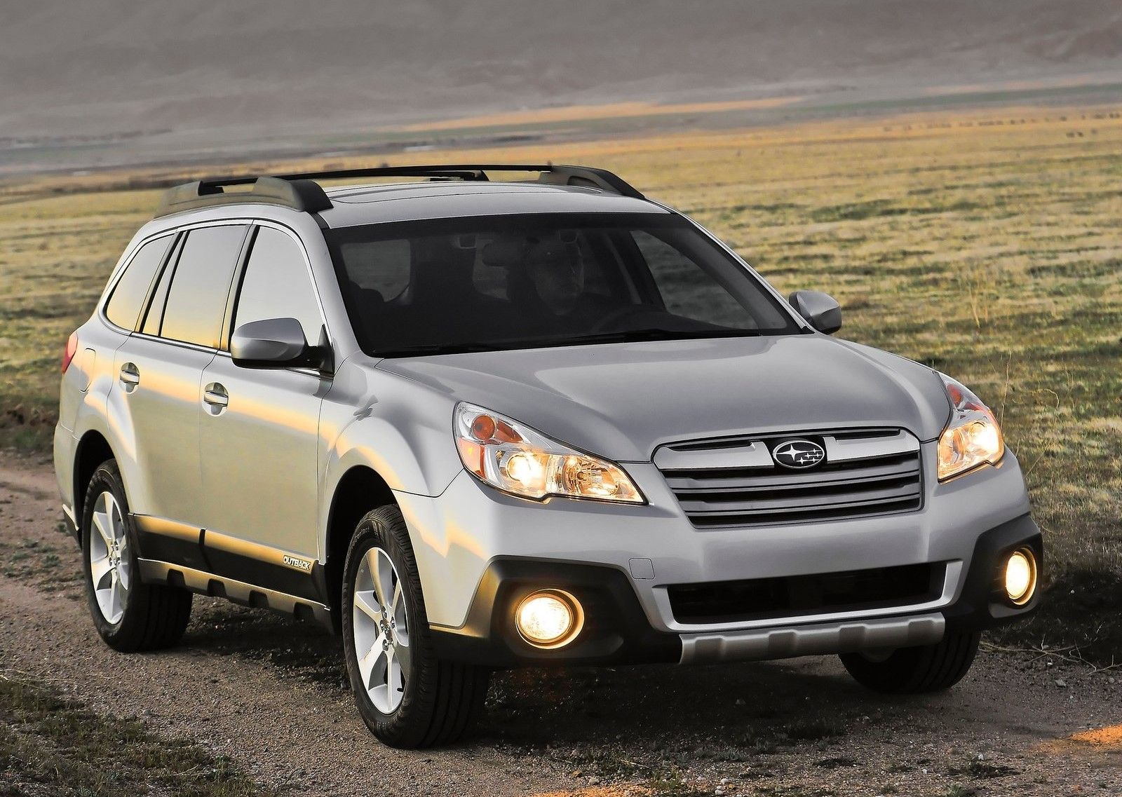 Gray 2013 Subaru Outback parked outdoors