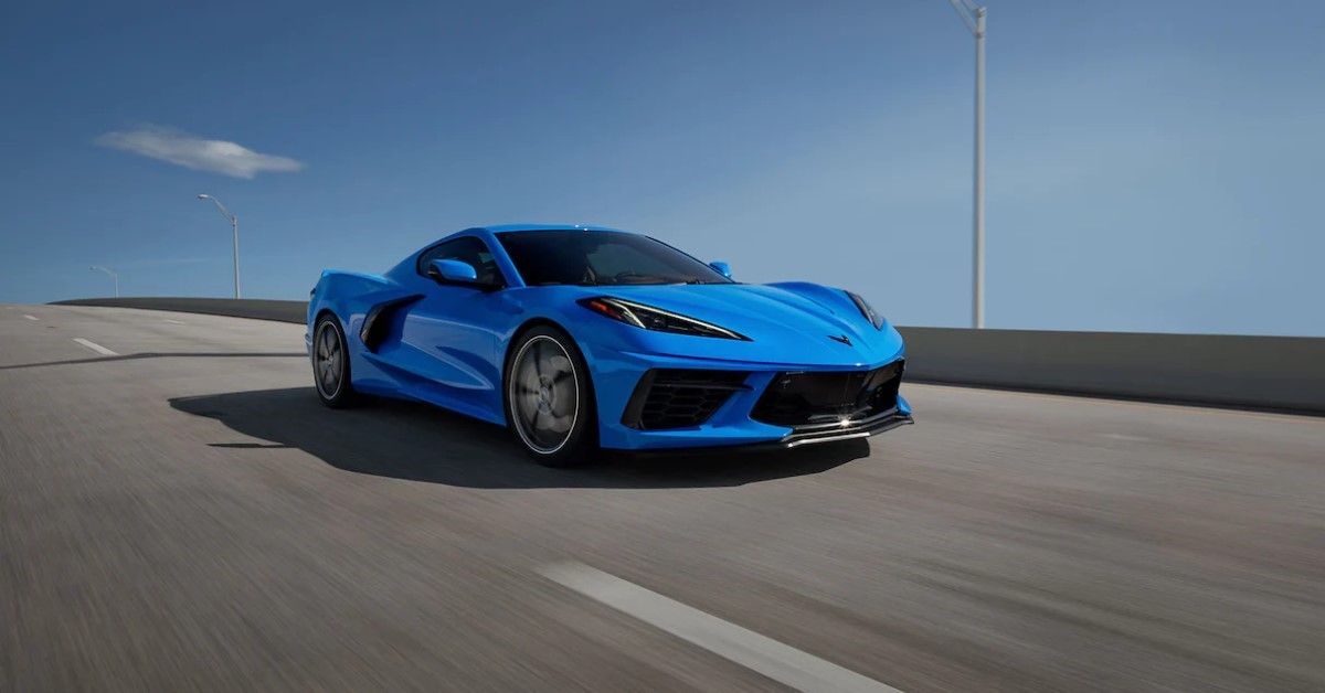2023 Chevrolet C8 Corvette Stingray in blue on the freeway front third quarter view