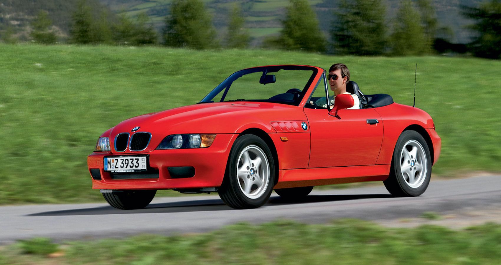 Red BMW Z3 sports car driving