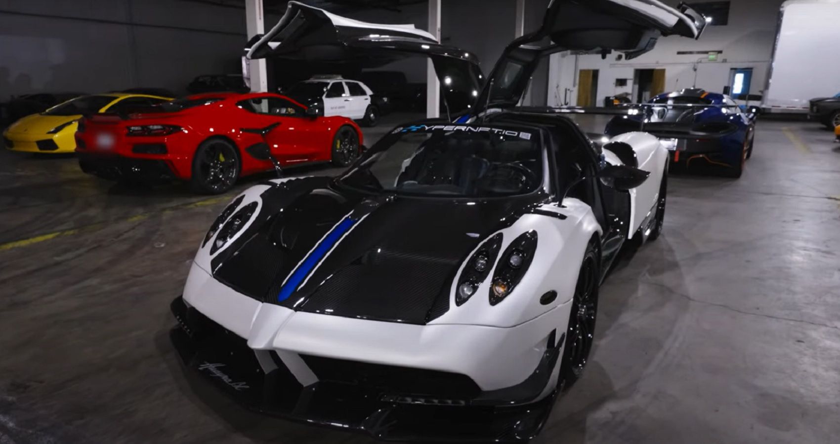 C8 Chevrolet Corvette Z06 and Pagani Huayra BC in a garage