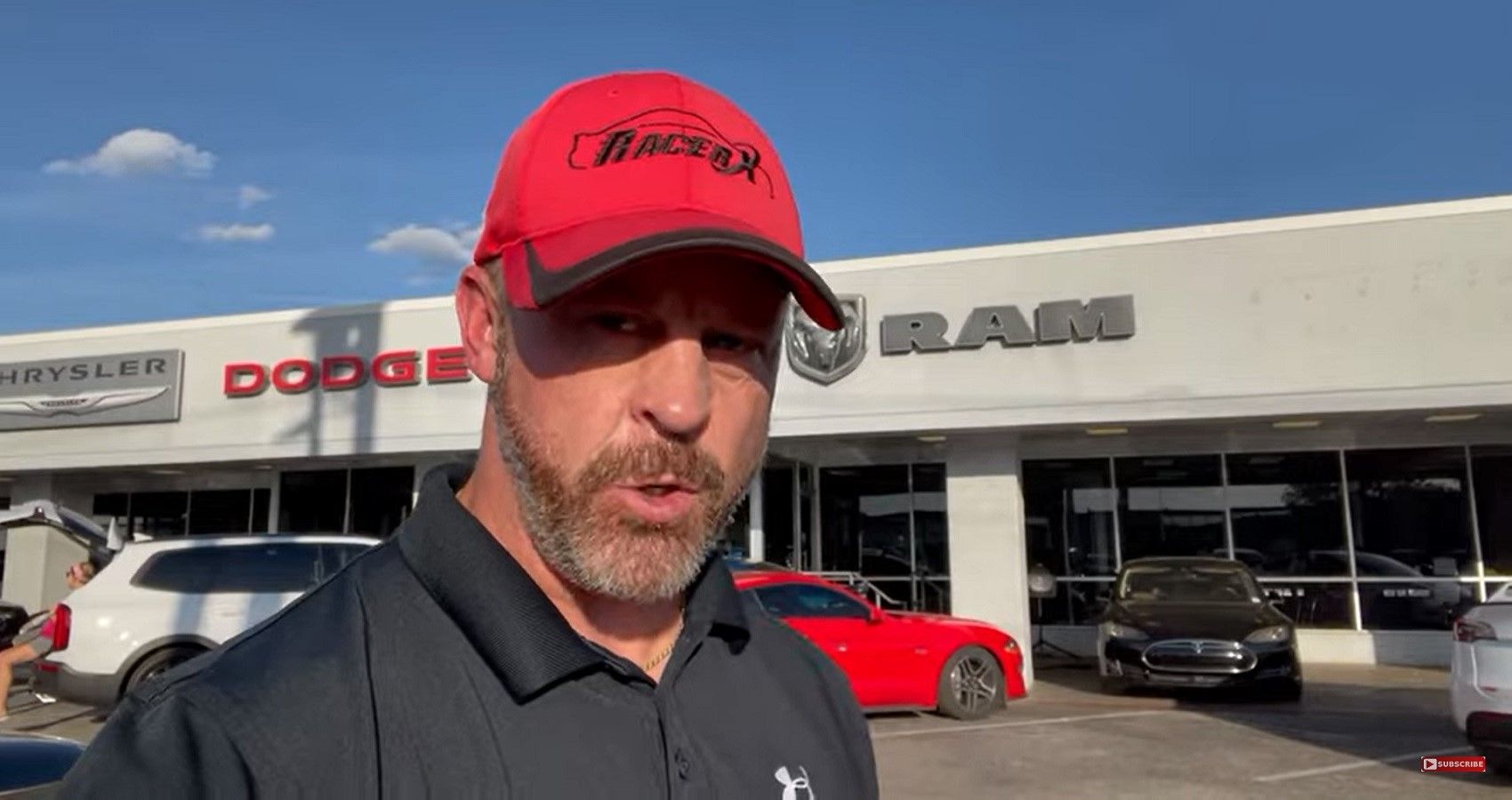RacerX at Tampa Dodge dealership, shot of man infront of building