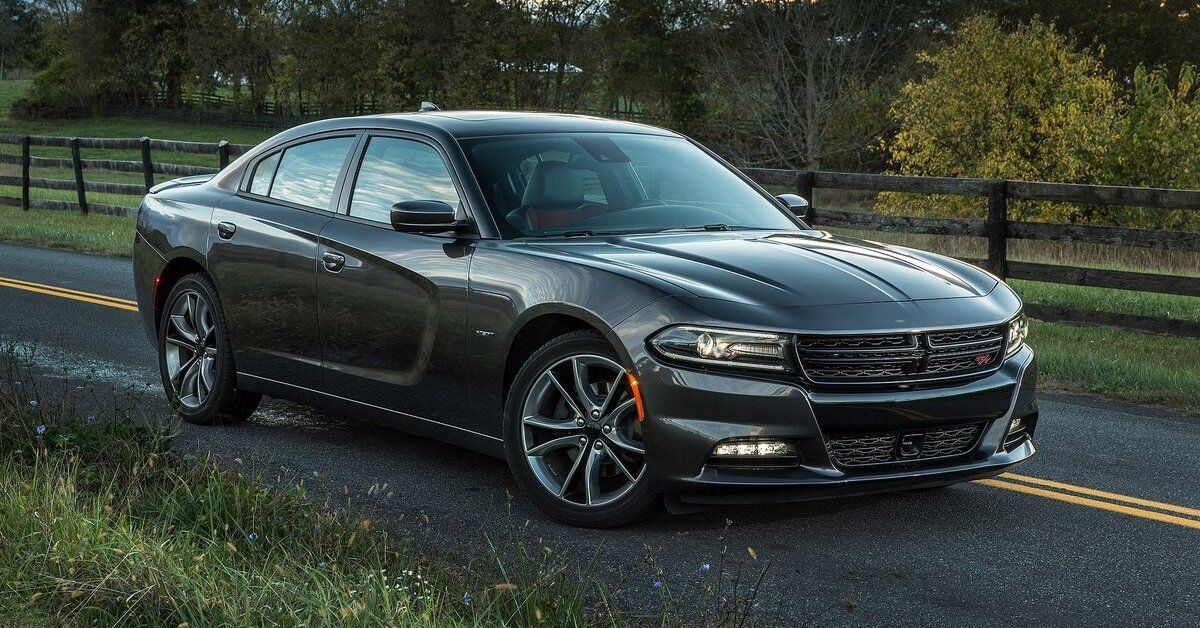 A gray 2015 Dodge Charger is parked