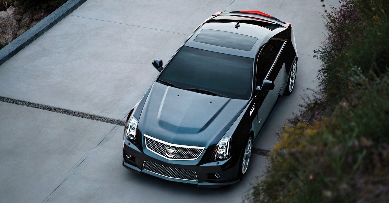 CTS V coupe Birds Eye black buildings
