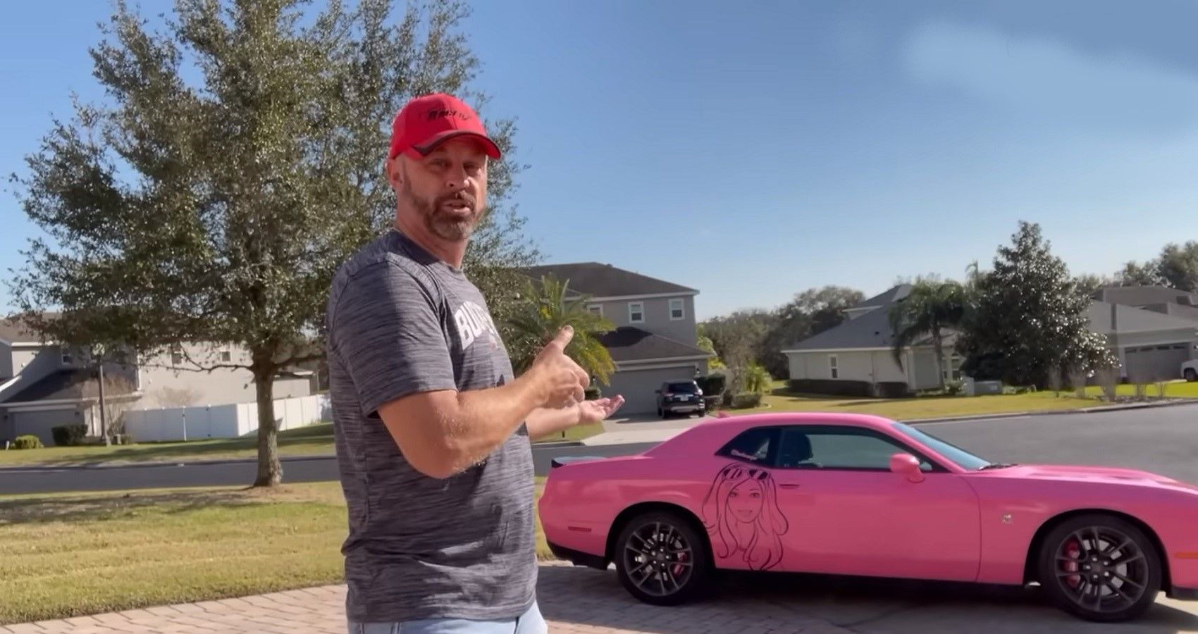 RacerX with Barbie Mopar Dodge Challenger, man in front of car