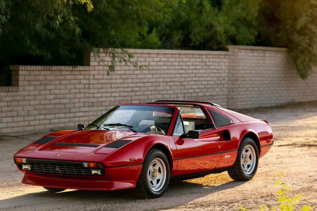 Red Ferrari 308 GTS parked