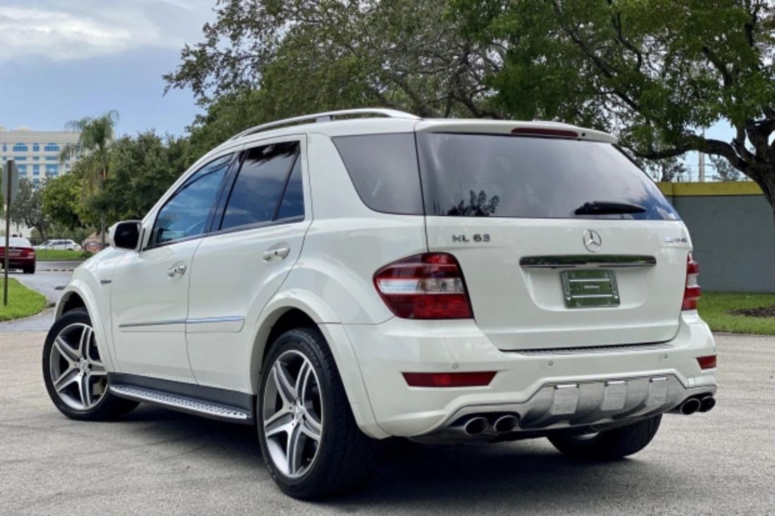 White Mercedes ML63 AMG SUV parked