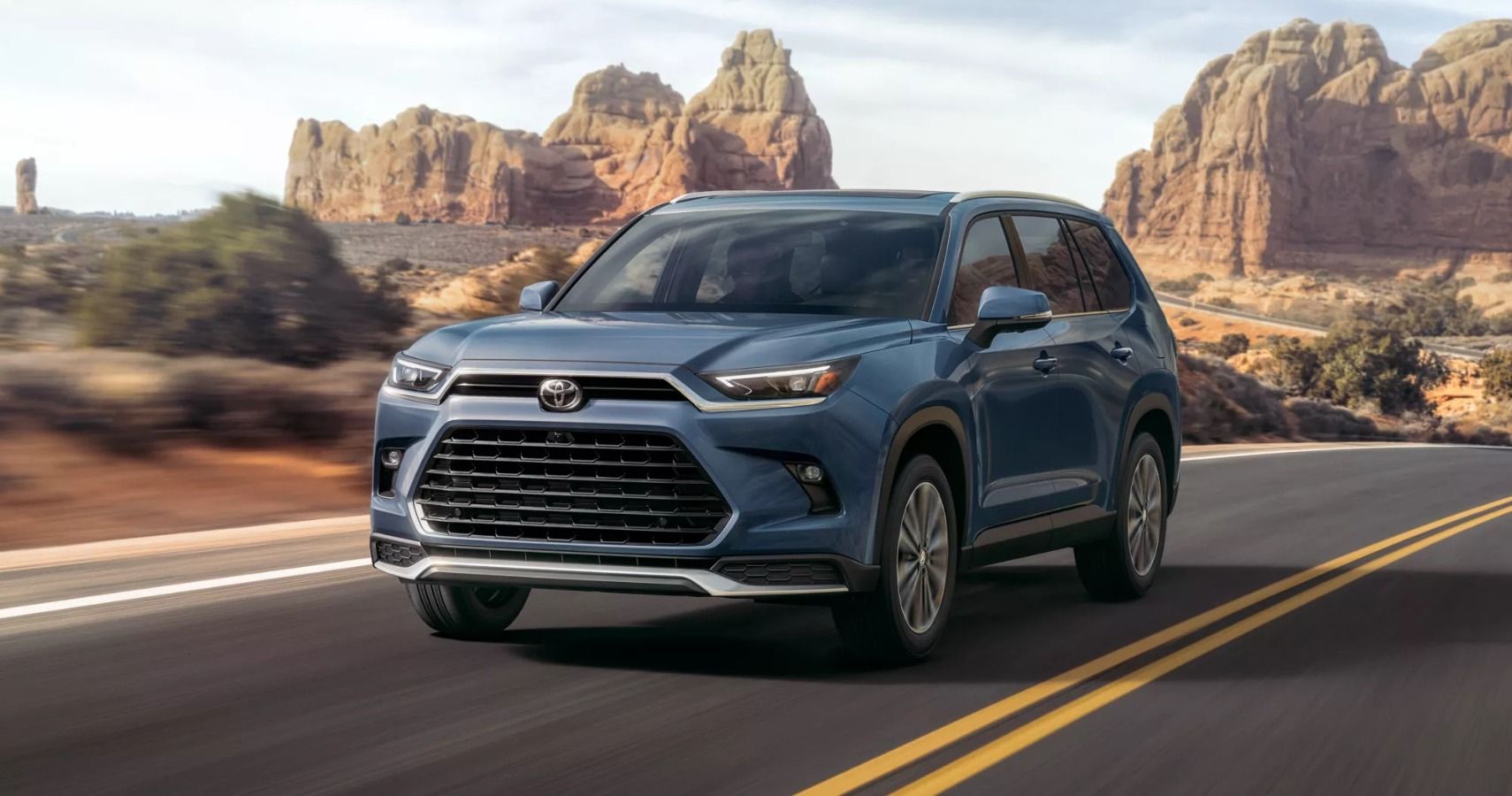 The 2024 Toyota Grand Highlander on the road. 
