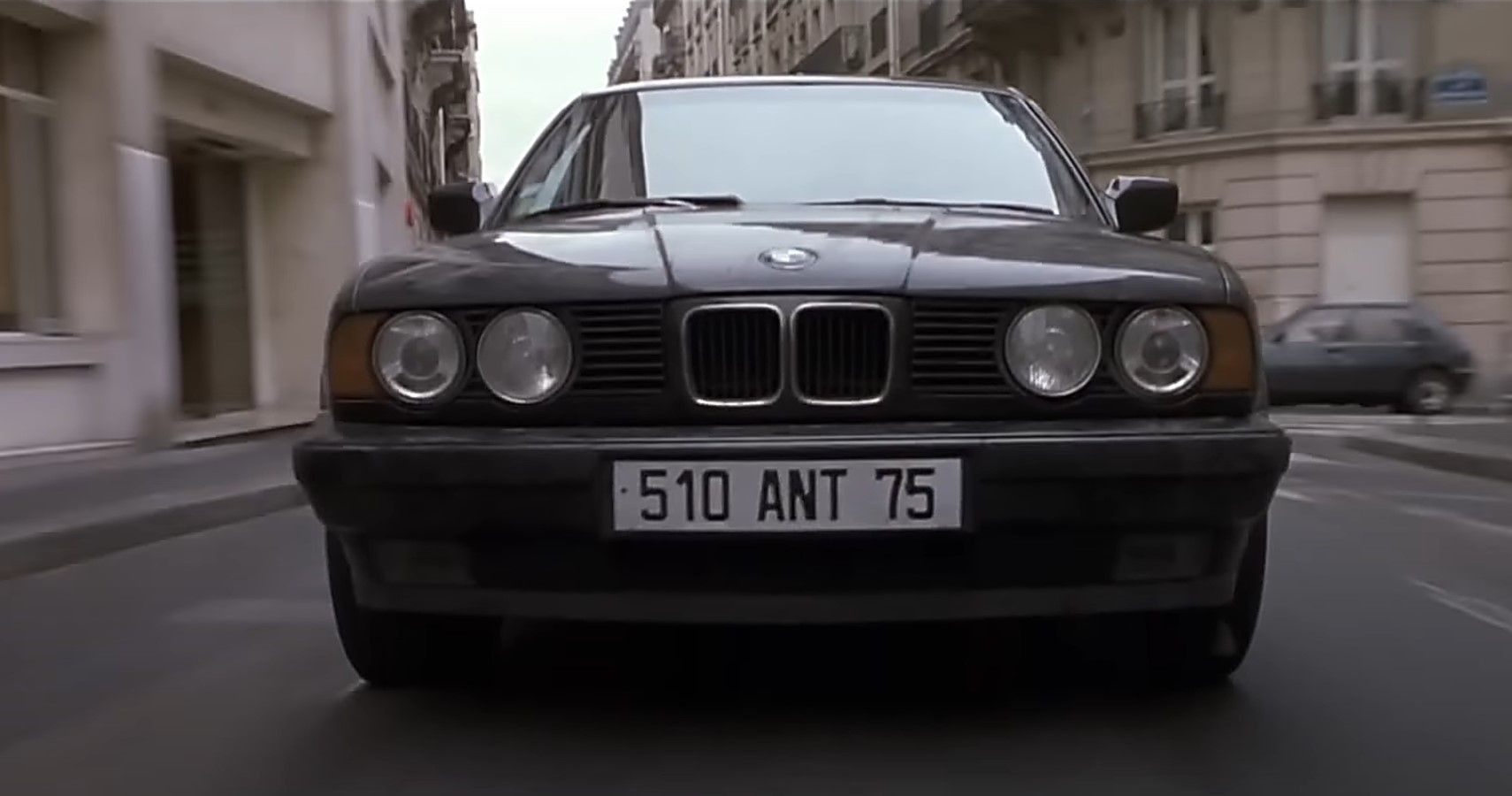 Black BMW E34 M5 driving