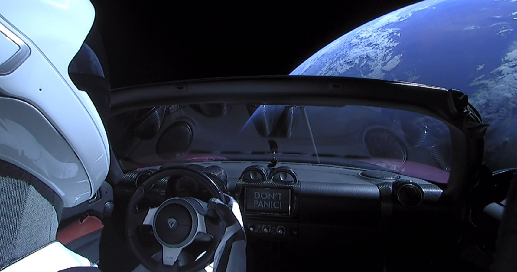 Starman chillin in the Tesla Roadster in space cabin view