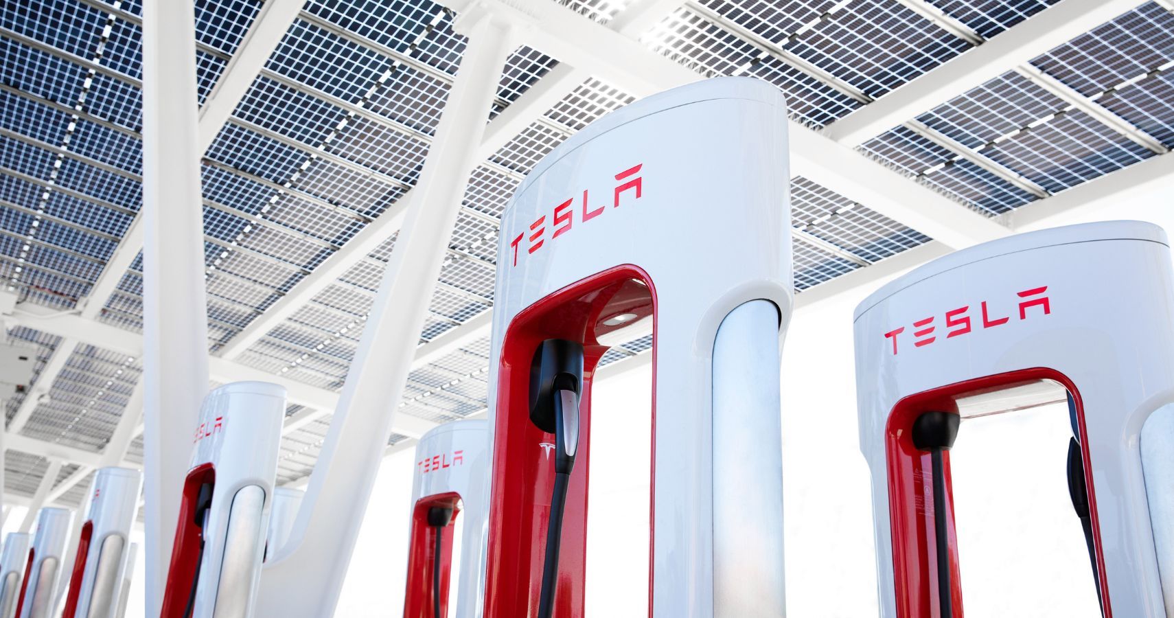 Tesla Supercharger Station Close Up Under Solar