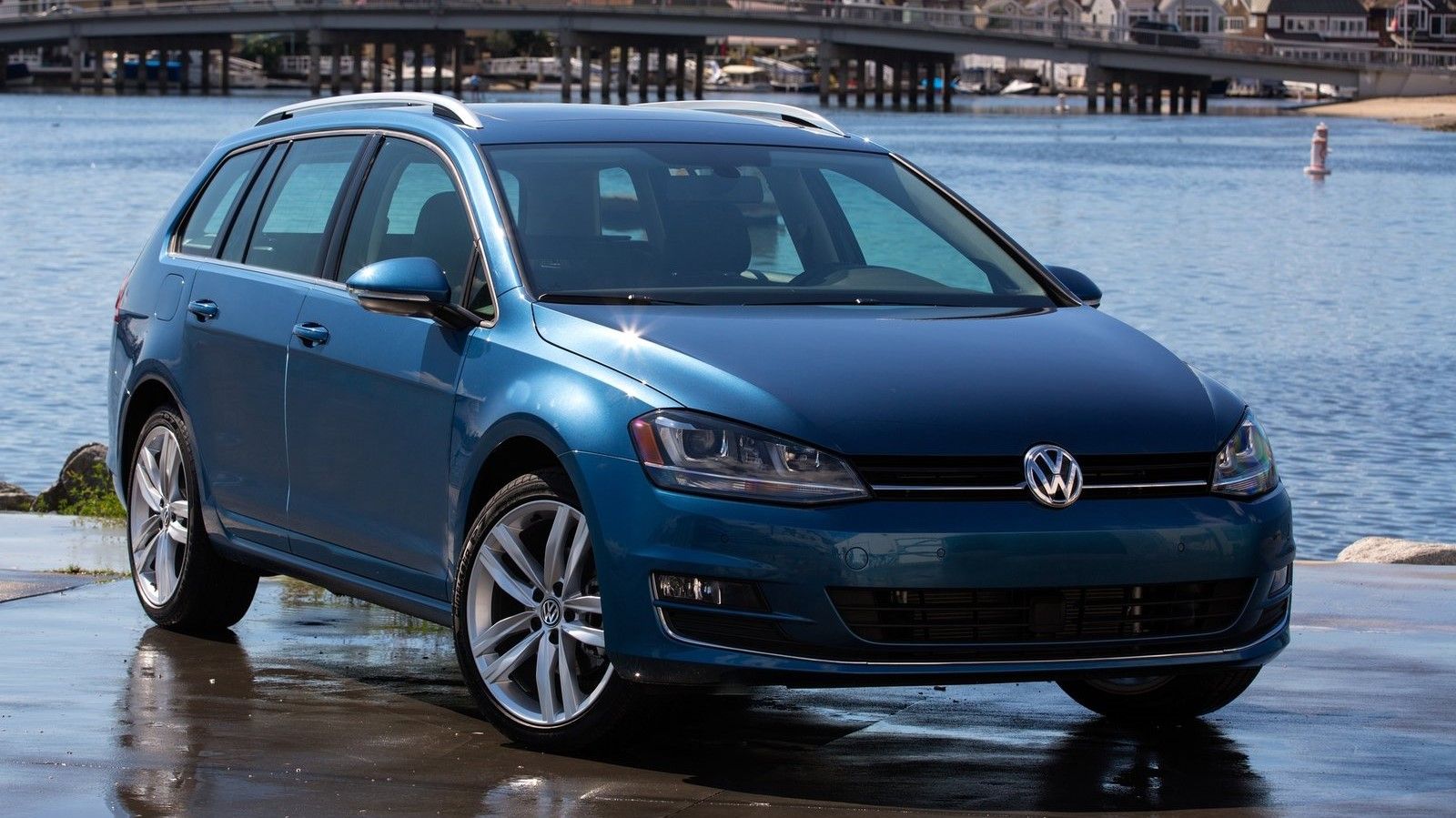 Blue 2015 Volkswagen Golf Sportwagen parked outdoors