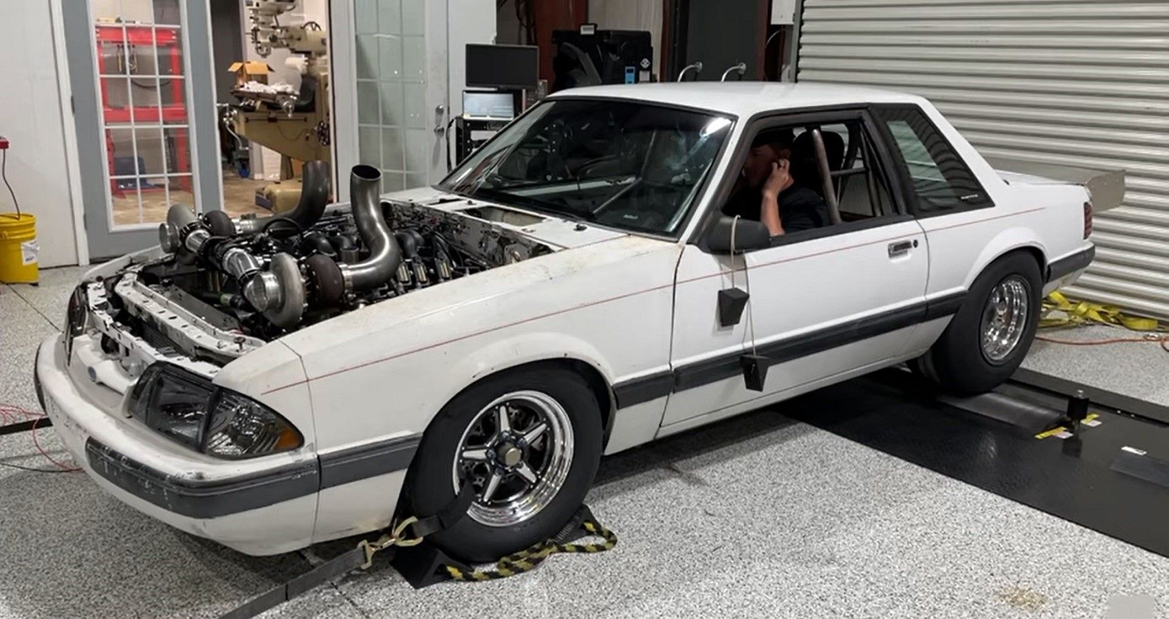 Ford Fox Body Mustang on dyno, front quarter view