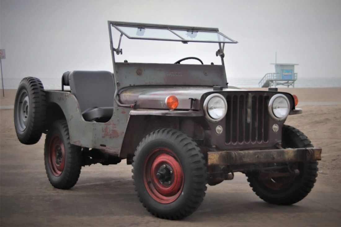 Gray Willys Jeep parked
