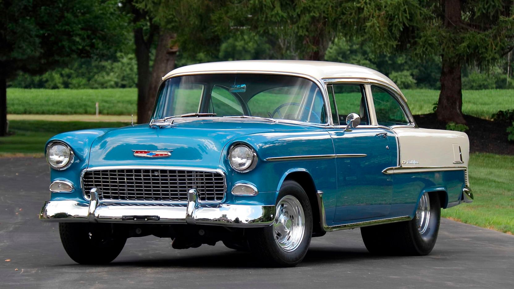 Blue 1955 Chevrolet Bel Air on the road