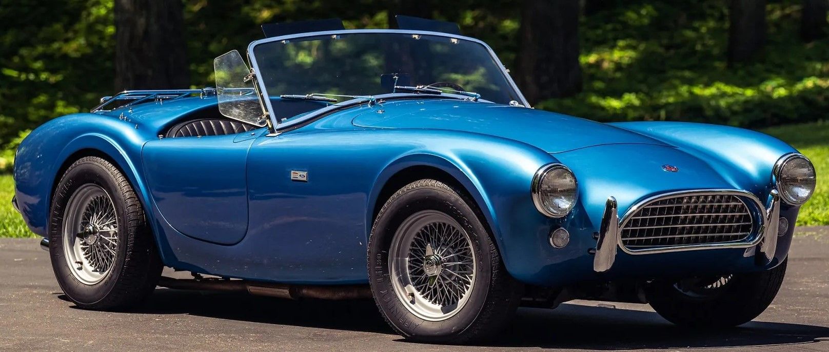 Blue1963 Shelby Cobra CSX 2000 Series parked outdoors