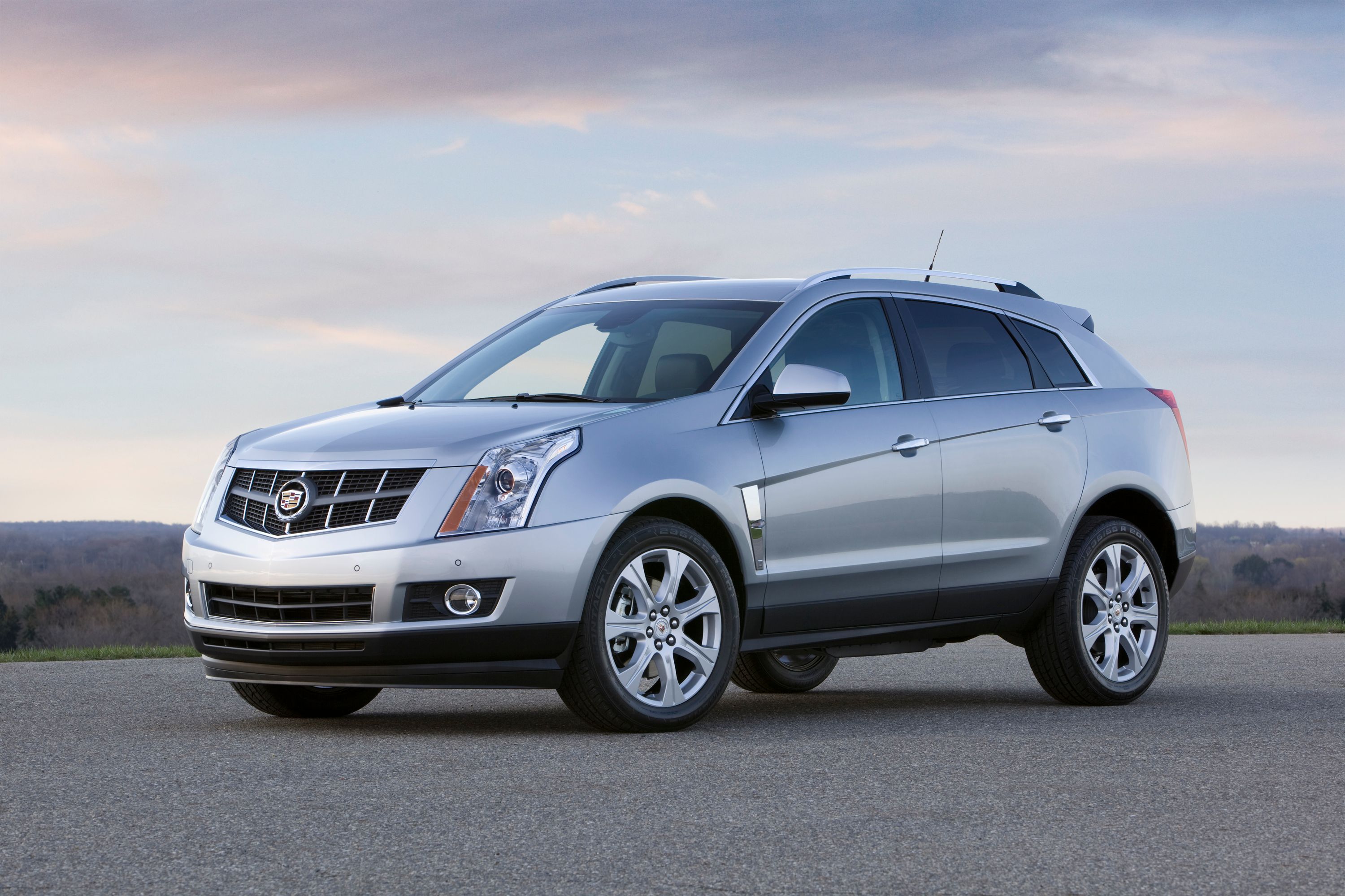 Silver 2010 Cadillac SRX on the road