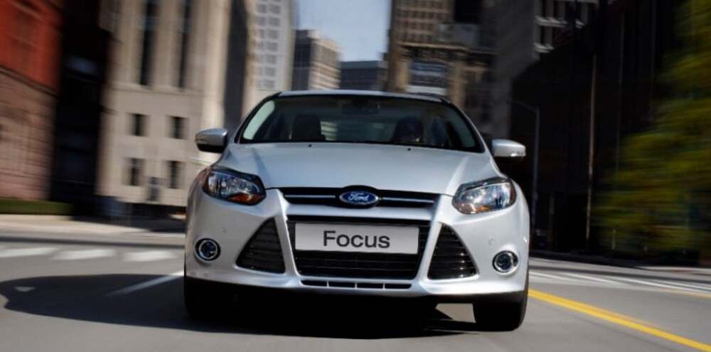 Silver 2014 Ford Focus on the road