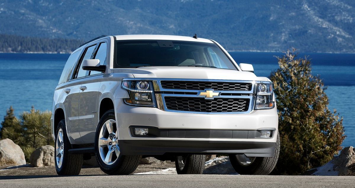 White 2015 Chevrolet Tahoe parked outside