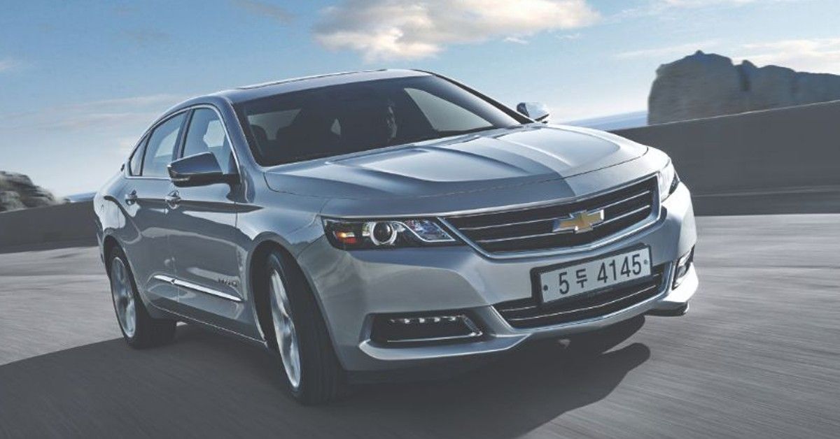 Silver 2016 Chevrolet Impala on the road