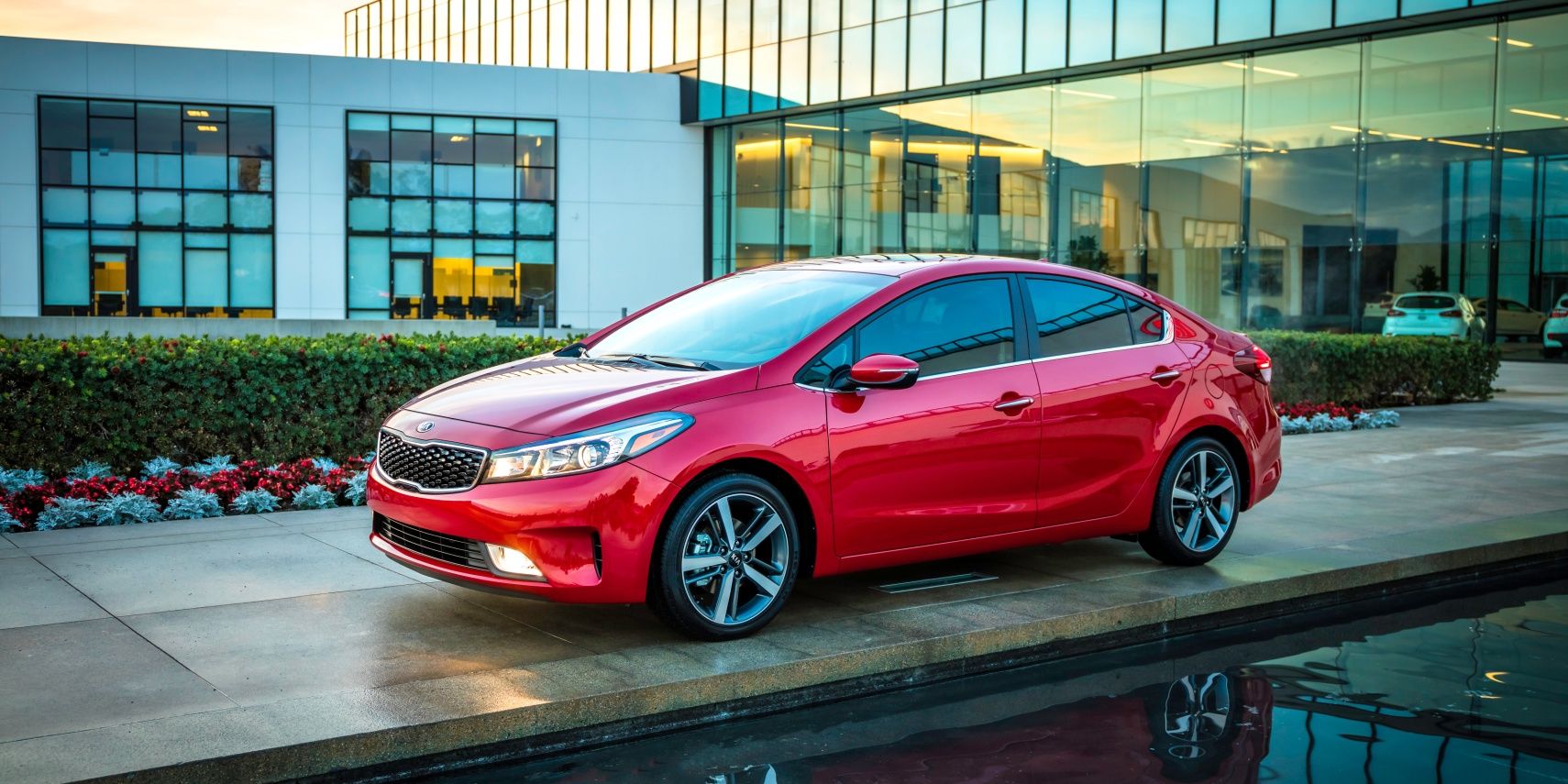 Red 2018 Kia Forte on the driveway