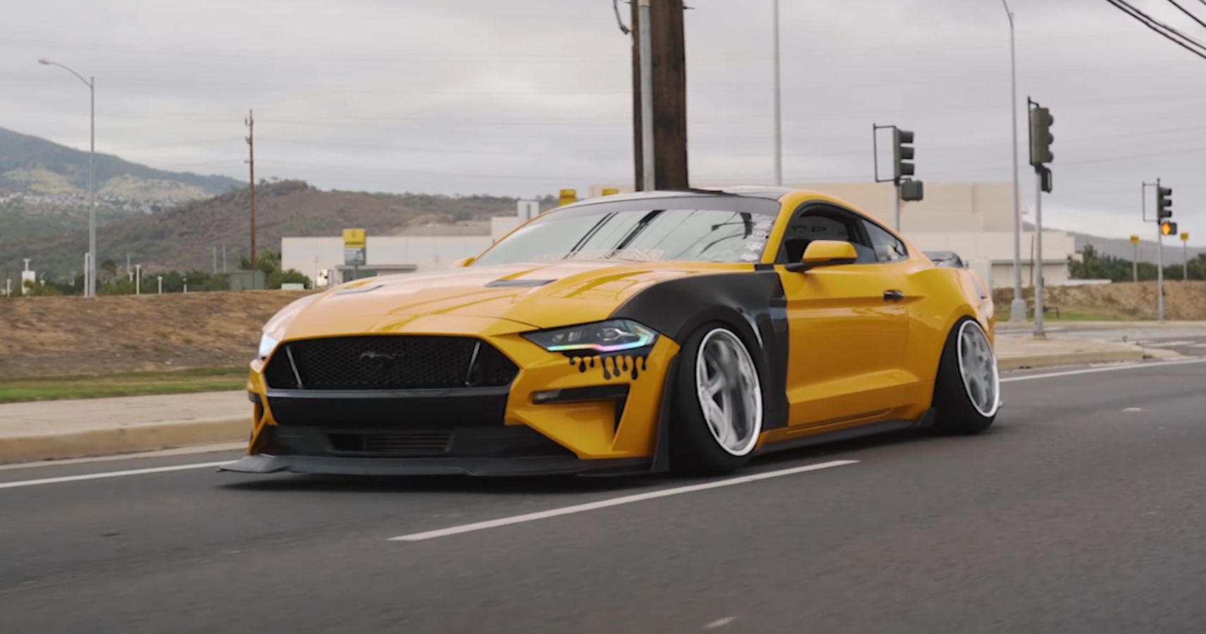 Yellow 2021 Ford Mustang S550 camber stanced 